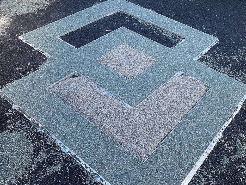 This is a photo of a gravel driveway installed in Wigan by Wigan Resin Driveways